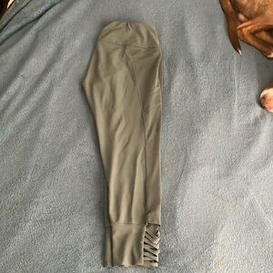 Teal/Green Leggings, with criss-cross design.